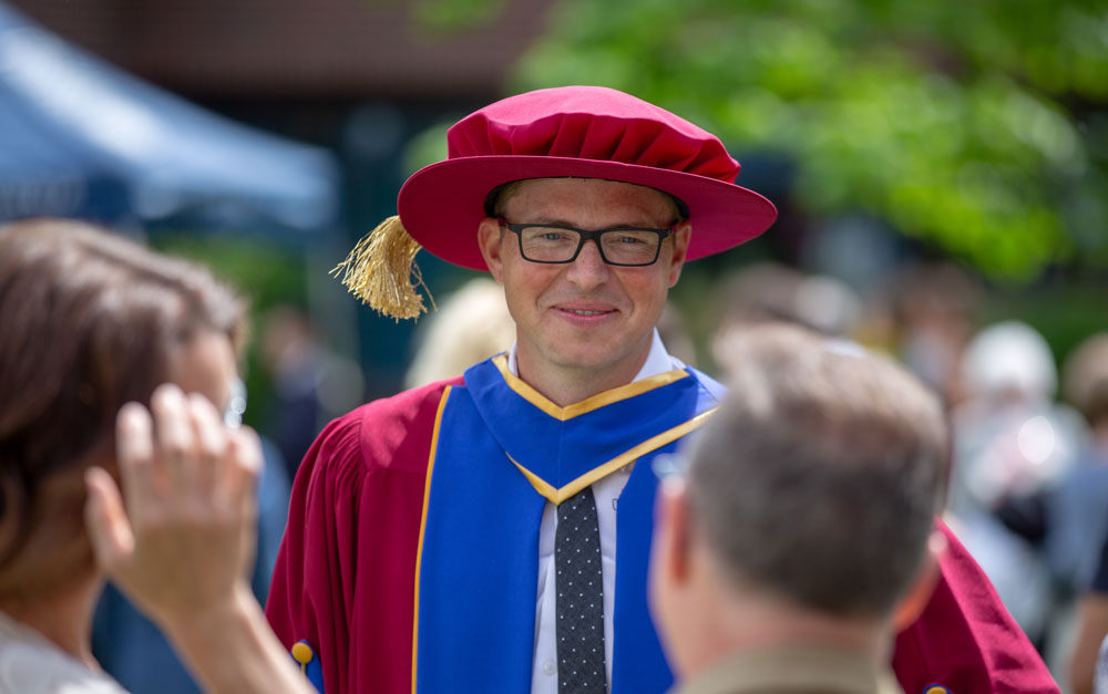 Postdoctoral fellow Ryan Wilson in his PhD graduate gown