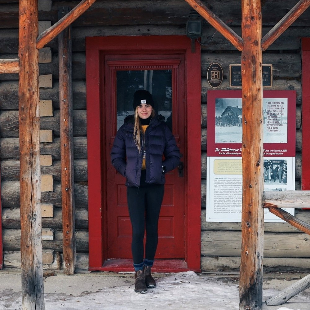 Nursing student outside heritage building in the Yukon