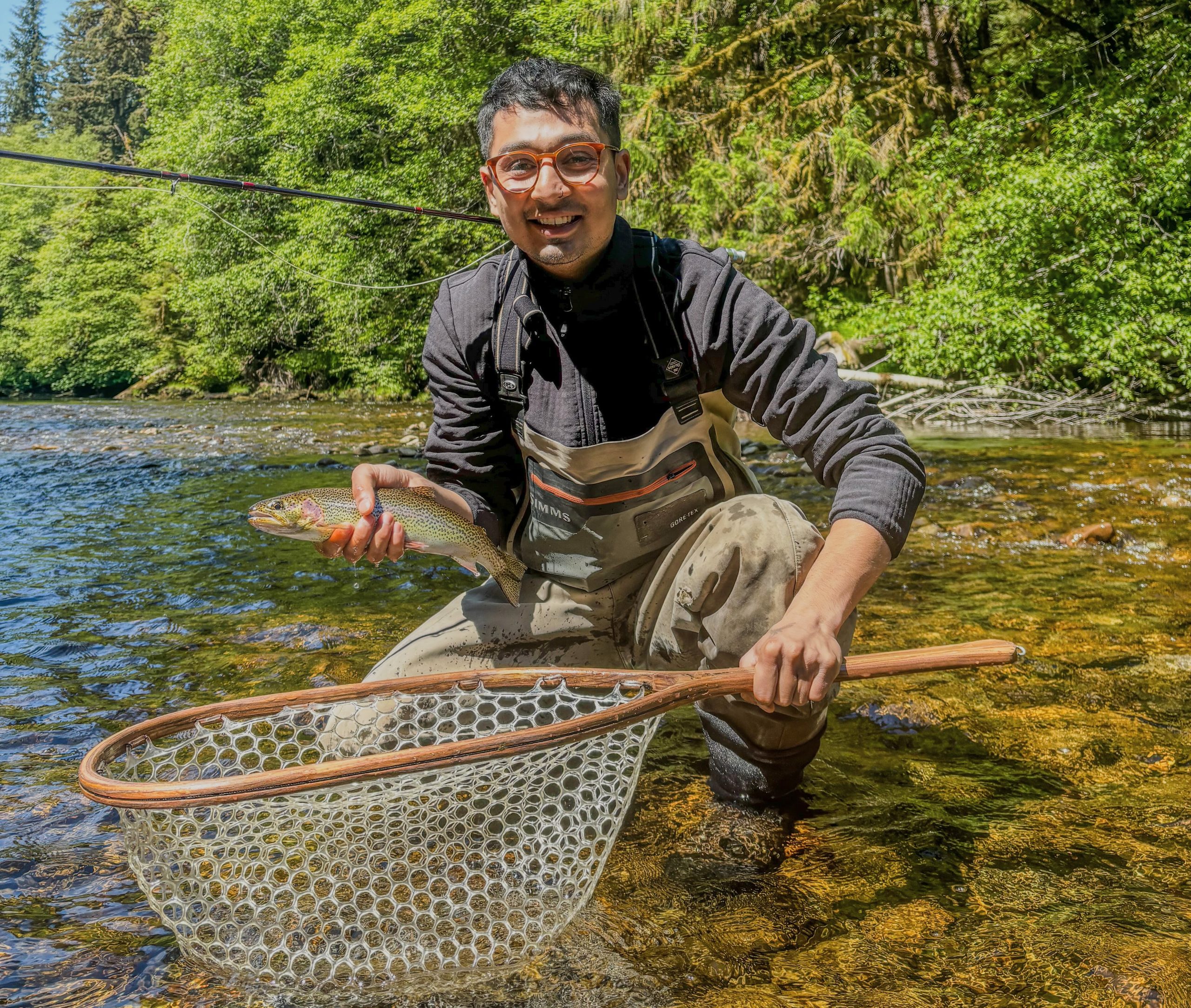 Nomawn with cutthroat trout