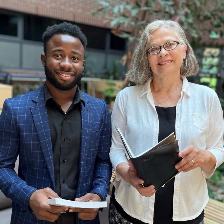 Student Ali Bawamia and supervisor Lise Olsen standing together.